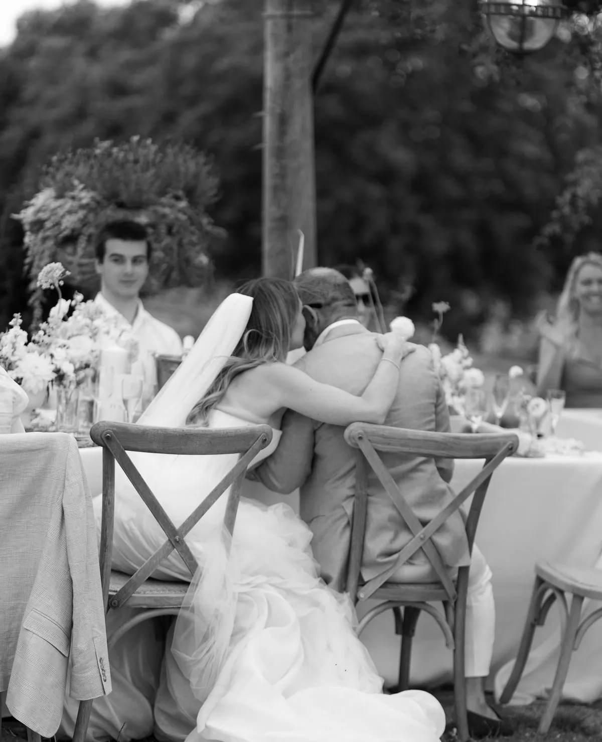 A bride having her makeup done on the morning of the wedding